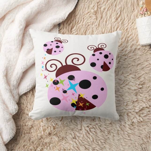 Coussin Trois coccinelle rose et noire avec étoiles (Couverture)