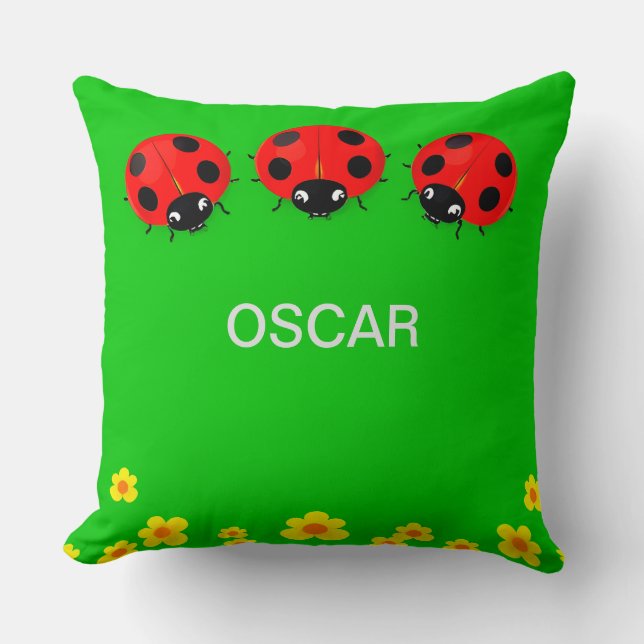 Coussin Trois coccinelles colorées sur fond vert (Recto)