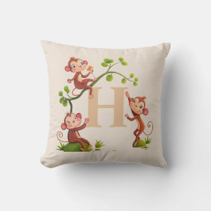 Coussin Trois jolis singes et monogramme doré sur beige