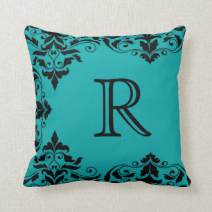 Coussin turquoise et noir de damassé de monogramm