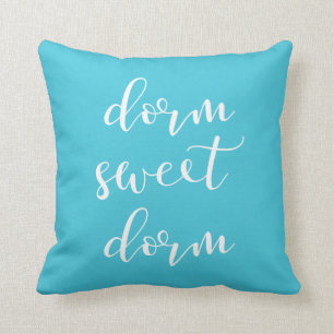 Coussin Turquoise réversible et dortoir blanc de bonbon 