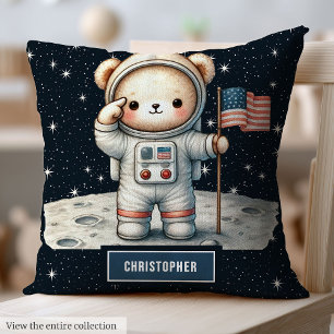 Coussin Un astronaute douillet à l'ours en peluche lance l