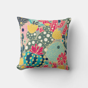 Coussin Un cactus mignon. Motif sans couture colorée.