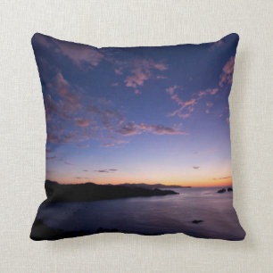 Coussin Un coucher du soleil au-dessus de l'océan en le