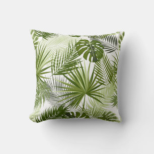 Coussin un motif de feuilles luxuriantes et tropicales