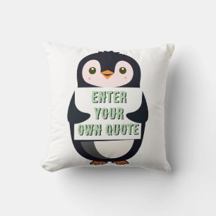 Coussin Un pingouin tenant un panneau avec un texte person