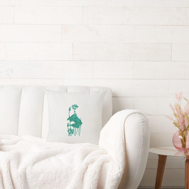 Coussin un tableau d'une fleur et d'un poisson sur un doss (Canapé)