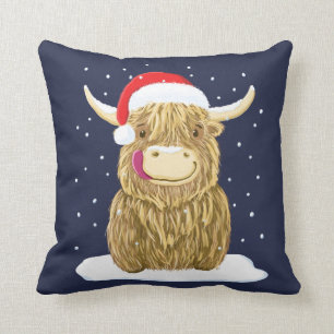 Coussin Vache des montagnes écossaise dans la neige de