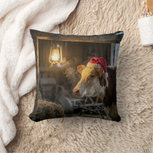 Coussin Vache Hereford de Noël dans une grange