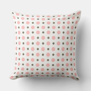 Coussin vert sauge et points rose clair sur fond blanc