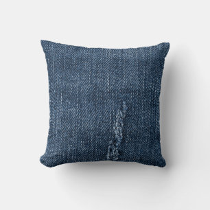 Coussin Vieux denim déchiré : texture de jeans.
