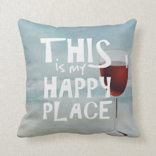 Coussin vin rouge avec arrière - plan de l'océan