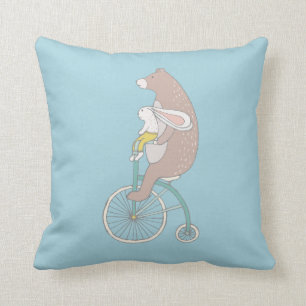 Coussin Whimsical Bunny and Bear Riding a Bike