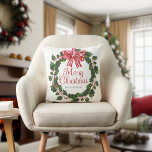 Coussin Whimsical Holly Wreath Christmas<br><div class="desc">Celebrate the season with our delightful Whimsical Holly Wreath throw pillow, featuring a charming illustration of a Christmas wreath made of holly with a festive red and white striped bow that captures the magic of Christmas. The playful "Merry Christmas" greeting in the middle of the illustration is written in a...</div>