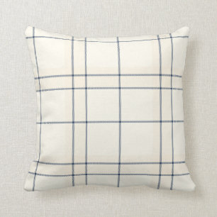 Coussins bleus et crèmes fanés de plaid de tartan