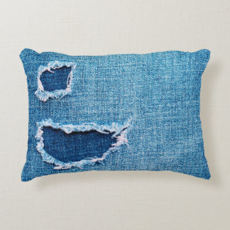 Coussins Décoratifs Arrière - plan de denim texturé. Trou déchiré dans