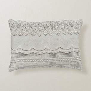 Coussins Décoratifs Dentelle blanche subtile, gros plan textile.