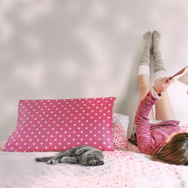 Coussins Décoratifs Dotty Delight Red (A girl is beside a Dotty Delight Red Accent Pillow on the bed.)