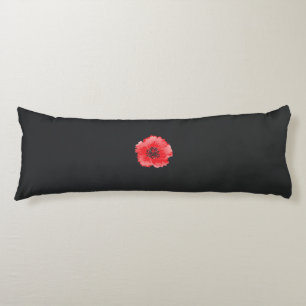 Coussins Longs une fleur rouge avec un centre noir sur un dossier