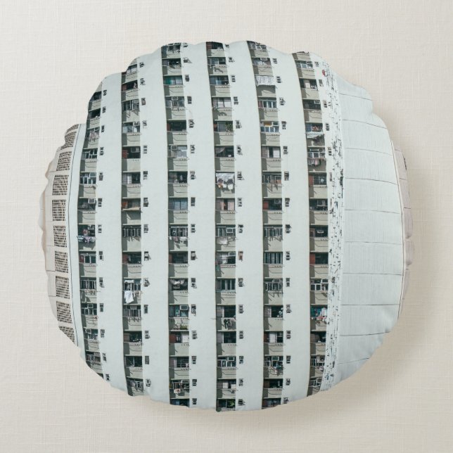 COUSSINS RONDS BÂTIMENT EN BÉTON BLANC ET BLEU (Devant)