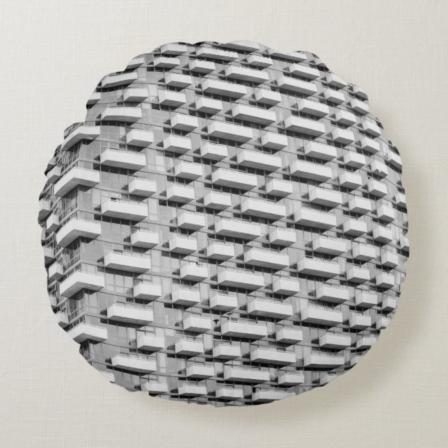 COUSSINS RONDS BÂTIMENT EN BÉTON GRIS (Devant)