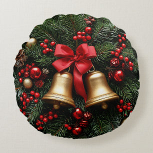 Coussins Ronds Cloche de Noël dorée sur des décorations de feuill