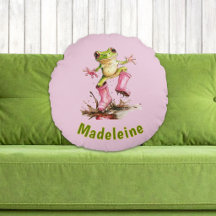 Grenouille en bottes roses mignonnes dans une flaq
