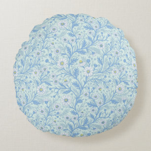 Coussins Ronds Marguerites en blanc et bleu sur verre de mer