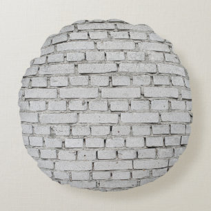 COUSSINS RONDS MUR EN BRIQUE BLANC