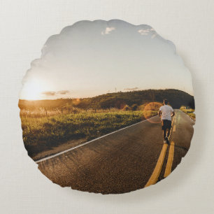 Coussins Ronds Personne qui court sur la route le matin