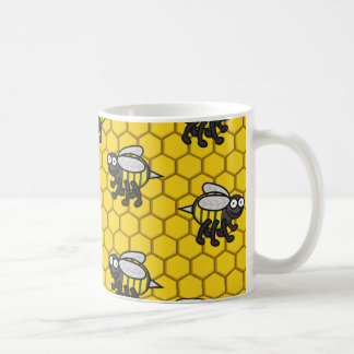 Couvert dans la tasse 2 d'abeilles