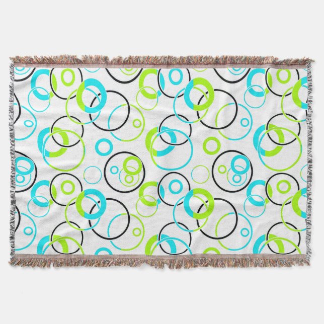 Couverture anneaux et cercles bleus, verts et noirs sur fond  (Devant)