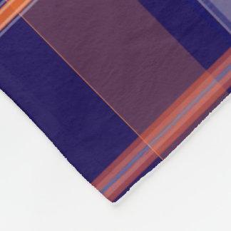 Couverture bleue et orange d'ouatine de plaid