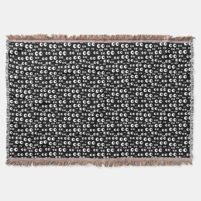 Couverture Boules blanches rondes pour les yeux sur plaid noi (Devant)