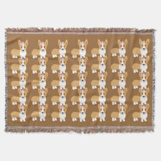 Couverture Chiens de corgi avec l'arc rose