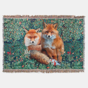 COUVERTURE FOXES ROUGES PARMI LA VERDURE, LE FOLIAGE ET LES F