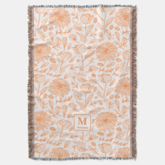 Couverture jeté à monogramme floral orange
