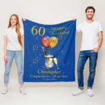 Couverture Polaire 60th Birthday Celebration Blue Fleece Blanket<br><div class="desc">A stylish 60th Happy birthday age blanket. Features a champagne bucket glasses and balloons and confetti all on a blue background with gold colored text. Perfect as a gift to celebrate a 60th birthday, something that they can cherish and snuggle up with, Can be customize by amending the titles and...</div>