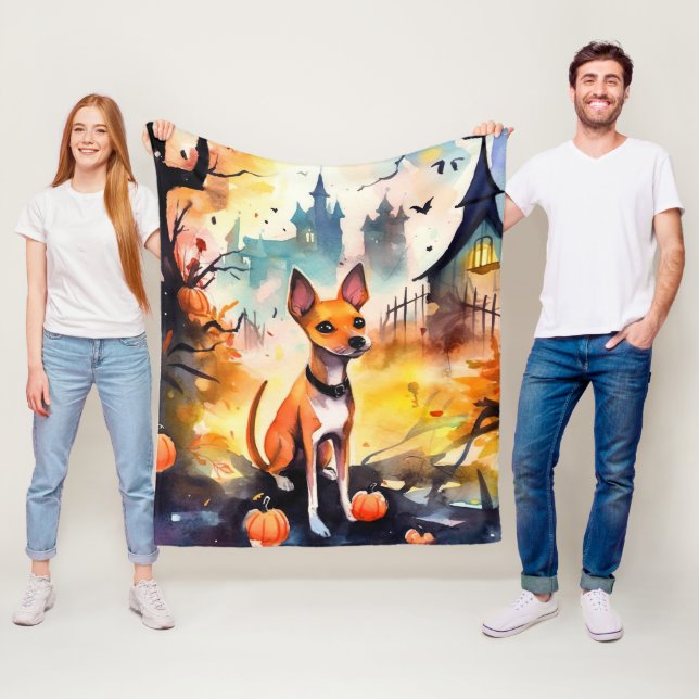 Couverture Polaire Basenji Halloween avec citrouilles effrayant  (En situation)