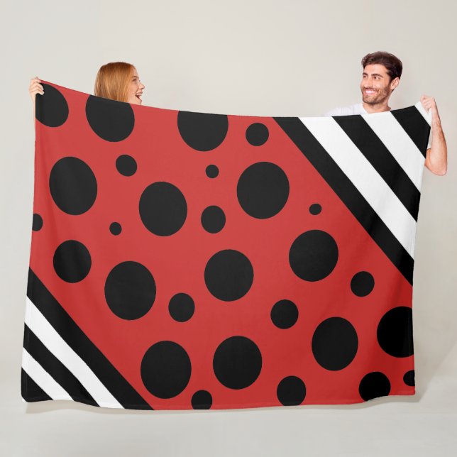 Couverture Polaire Blanche Pois rouge et blanche noire (En situation)