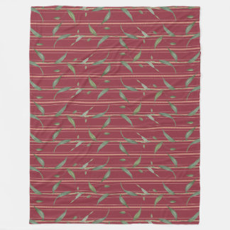 Couverture Polaire Branche de feuilles sur papier peint rouge