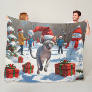 Couverture Polaire Chat Sphynx courant dans la neige avec un chapeau