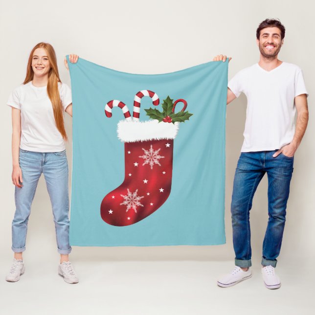 Couverture Polaire Chaussette de Noël festive rouge sur fond bleu  (En situation)