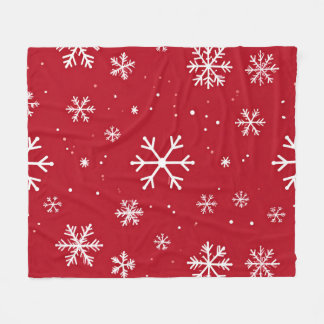 Couverture Polaire Festive red background with white snowflakes