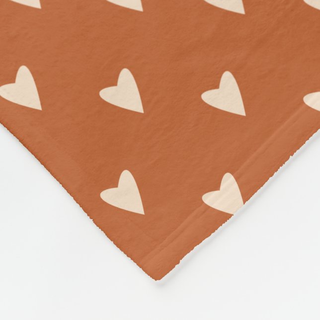 Couverture Polaire Géométrie en amour - crème sur ocre rouge - motif. (Coin)