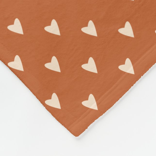Couverture Polaire Géométrie en amour - crème sur ocre rouge - motif. (Coin)