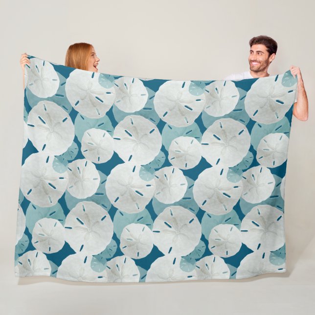 Couverture Polaire Grands dollars en sable blanc motif bleu (En situation)