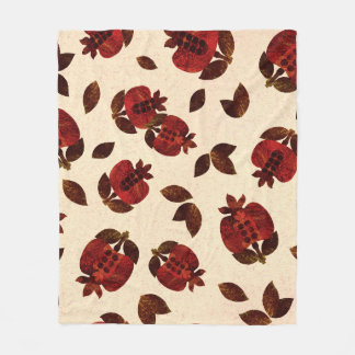 Couverture Polaire grenades brillantes : motif répétitif fait main.