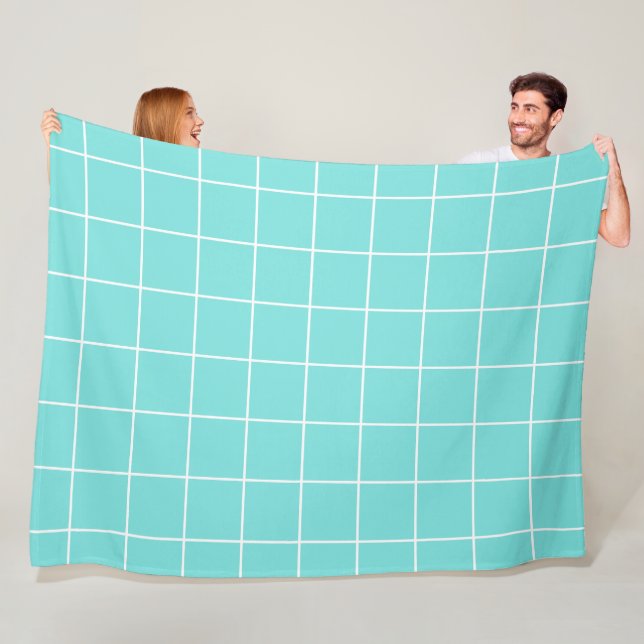 Couverture Polaire Grille Turquoise et blanche (En situation)