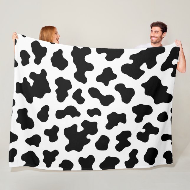 Couverture Polaire Impression cuir de vache noir et blanc (En situation)